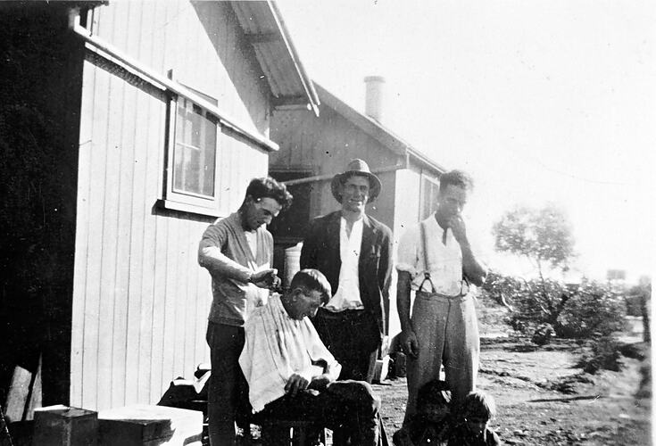 [Hair cutting at fettler's huts, Hattah, 1932.]