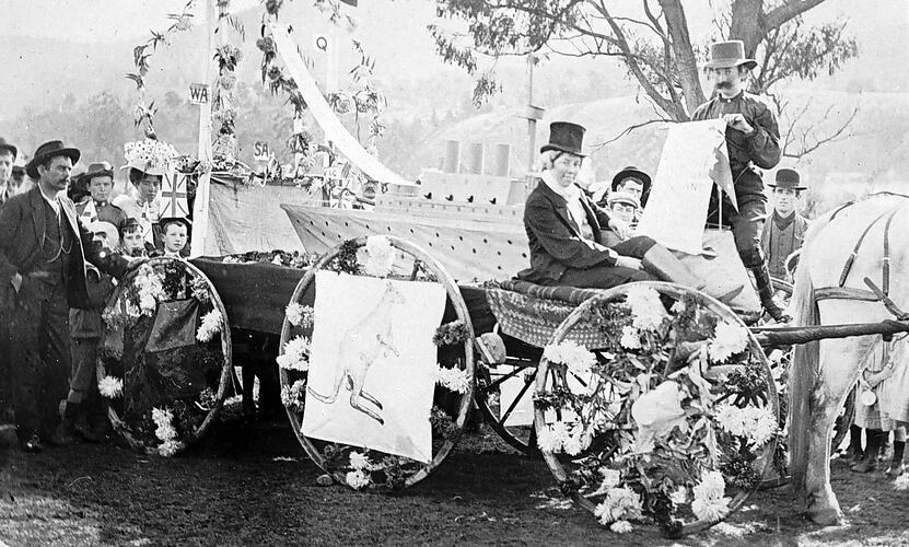 A wagon decorated for a procession.