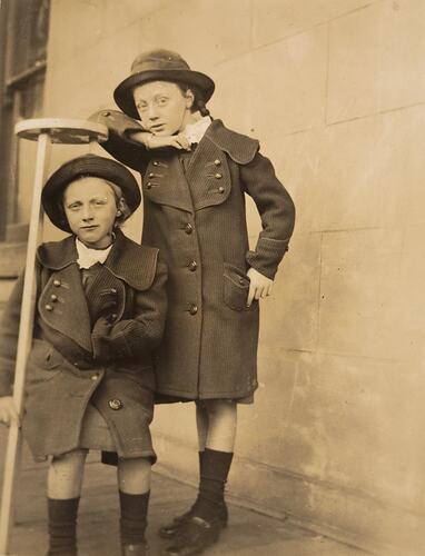 Digital Photograph - Two Girls in Hats & Coats on verandah, Kew, 1913
