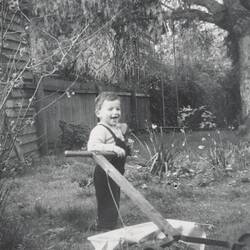 Digital Photograph - Boy Helping Dad Mow the Lawn, Backyard, Kew, 1954