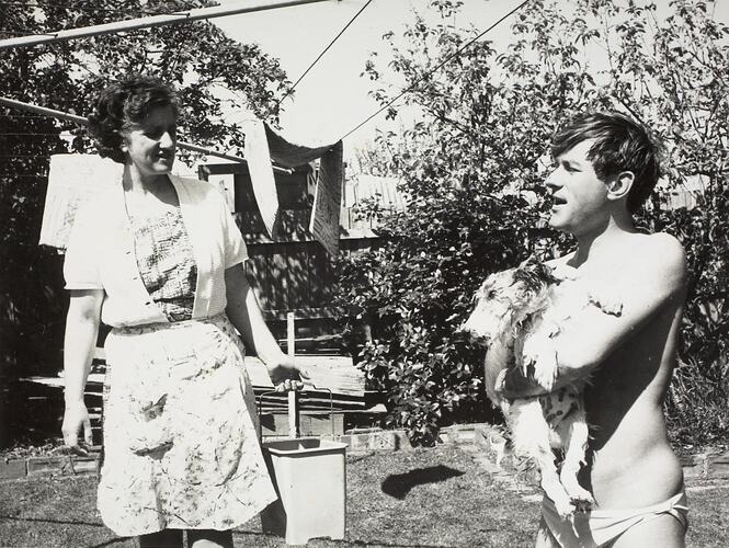 Digital Photograph - Woman and Man with Newly Washed Dog, Backyard, Caulfield, 1968
