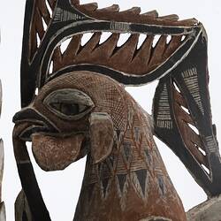 Mask house ornament, detail of bird head