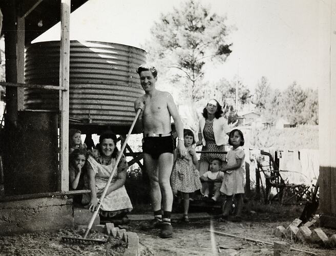 Family Gardening in Backyard, near Water Tank, Ringwood East, 1956