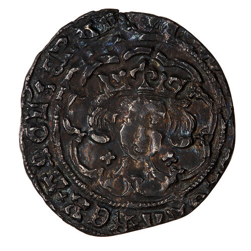 Coin, round, crowned bust of the King facing within a tressure of nine arches; text around.
