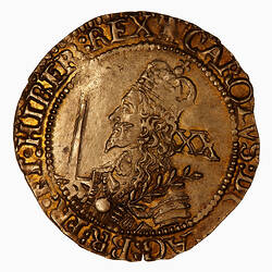 Coin, round, Crowned half-length king facing left, wearing armour, holding a sword and olive branch.