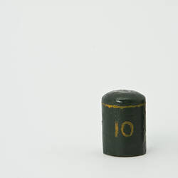 Green painted canister labelled 10 in gold