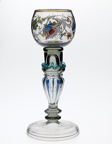 Wine glass with elaborate decoration.