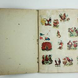 Open scrapbook page with various colour illustrations depicting birds, some birds wearing clothes.