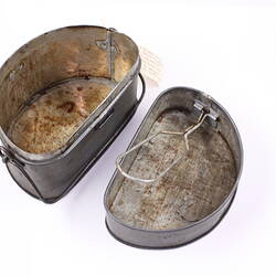 Metal tin with lid.