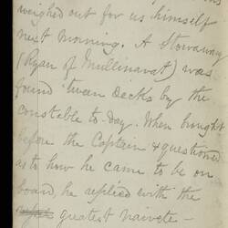 Open diary with handwritten text on discoloured worn page.