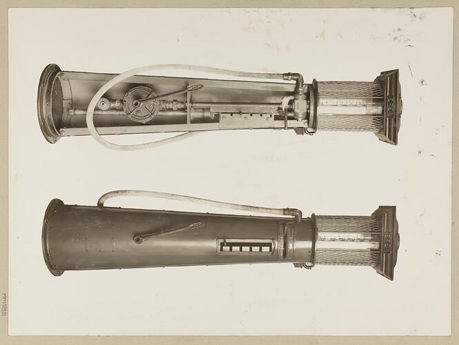 Monochrome photograph of a single cylinder petrol pump.