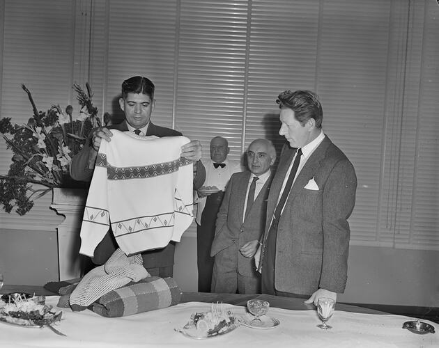 Australian Wool Board, Man Holding Knitted Jersey, Melbourne, Victoria, 11 Aug 1959