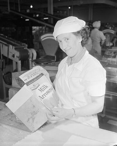 Swallow & Ariell Ltd, Woman Holding Biscuit Packaging, Port Melbourne, Victoria, 22 Sep 1959