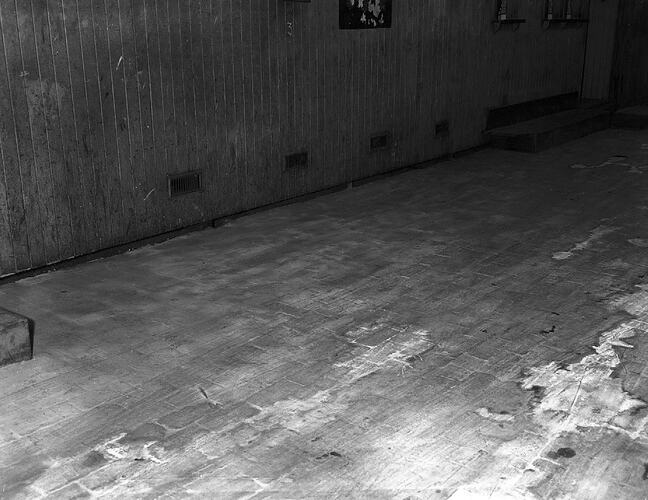 Monochrome photograph of a floor.