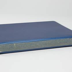 Photograph Album of harvesting equipment.