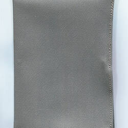 Grey wallet for calculator.