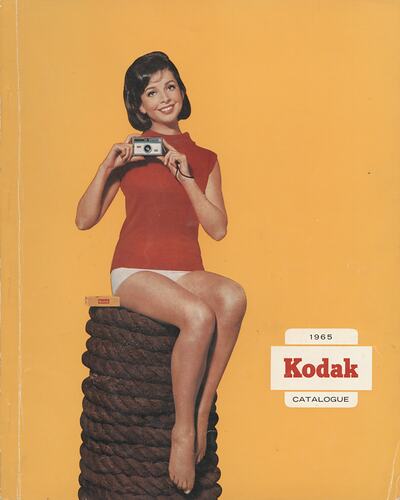 Cover page with photograph of woman and camera.