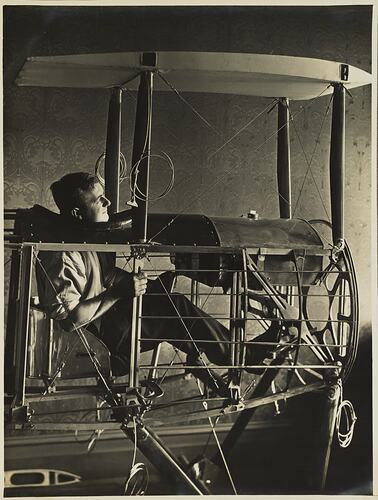 Basil Watson Seated in Cockpit of Partially Constructed Biplane Fuselage in the Family Home, Elsternwick, Victoria, 1916