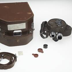 Movie camera with case and accessories.