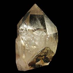 Pointed crystal, clear at top, cloudy at base.