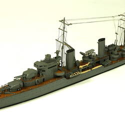 Naval ship with two masts, three quarter view.