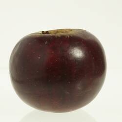 Dark red apple model. Profile.