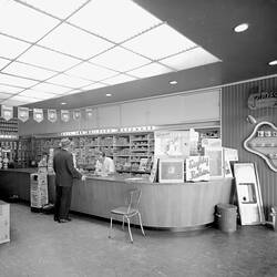 Negative - Man Serving Customer at 'Johnson's Hardware' Store, Melbourne, 1950s