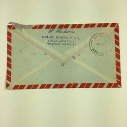 Back of addressed envelope with blue, white and red trim.