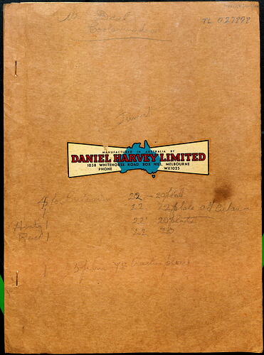 Brown cover with central blue Australia on yellow banner. Red text. Pencil handwriting on cover.