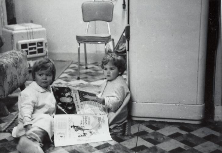 Digital Photograph - Two Girls in Pyjamas, Reading Women's Weekly Magazine, Kitchen, Lakes Entrance, circa 1968