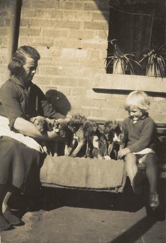 Digital Photograph - Woman & Girl with Puppies, Coburg, circa 1930