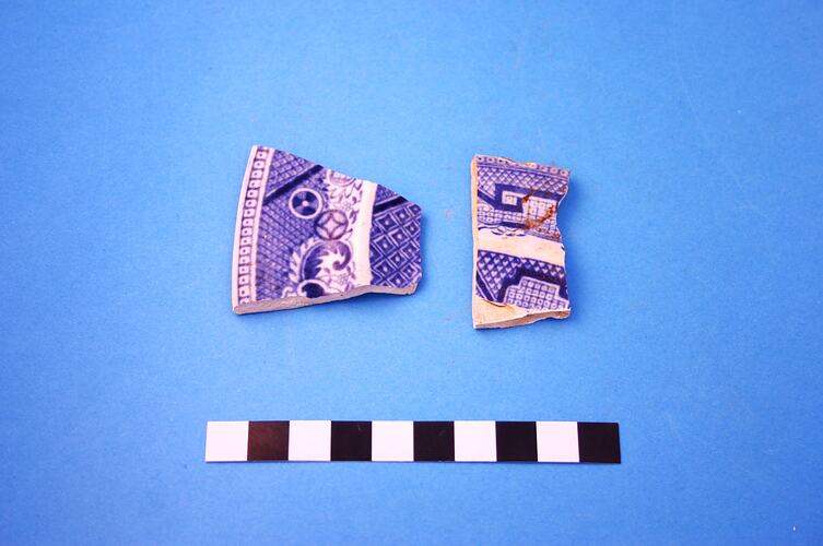 Broken blue and white pottery shards.