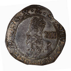 Coin, round, Crowned bust of the King facing left wearing a lace collar and armour; text around.