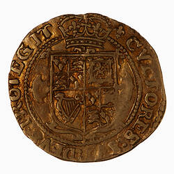 Coin, round, at centre crowned shield quartered with the arms of England, France, Scotland and Ireland.