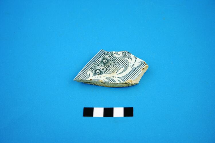 Fragment of earthenware platter rim.