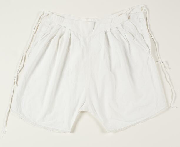 White pleated bloomers & tapes.