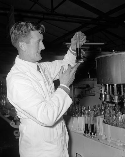 Negative - Coca-Cola, Worker in Factory, Moorabbin, Victoria, Aug 1954