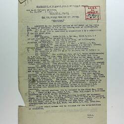 Single page on off-white paper with black printed text, red stamp on top-right corner.