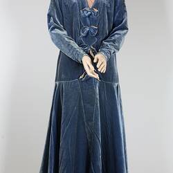 Long sleeved dress of pale blue cotton velvet.
