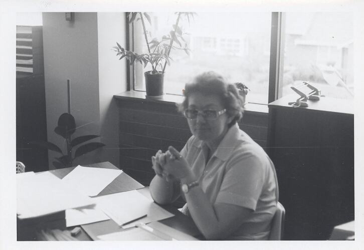 Photograph - Kodak Australasia Pty Ltd, Woman at Office Desk by Window, Building 8, Coburg, 1966
