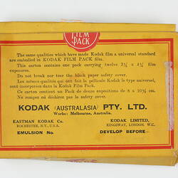 Back of film box printed with manufacturing details.