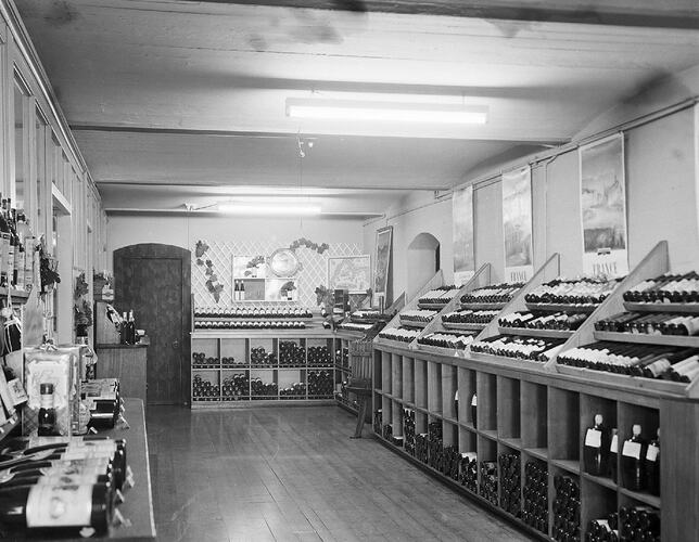 Monochrome photograph of a wine store.