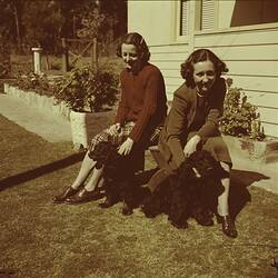 Women in Garden with Dogs, circa 1940s