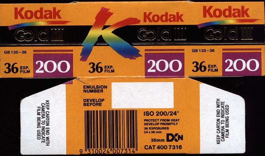 Flatpack box with rainbow 'K' logo and barcode.
