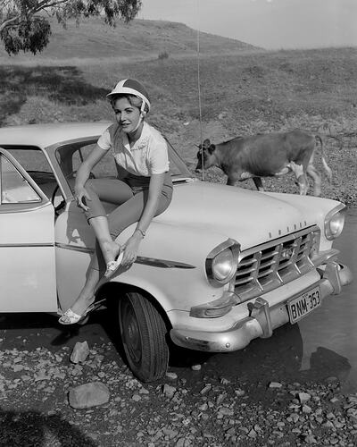 BF Goodrich Australia, Woman with a Motor Car Near a River, Somerton, Victoria, 05 Feb 1960