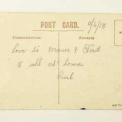 Back of postcard with printed and hand-written text.