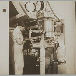 Photograph - Kodak Australasia Pty Ltd, Worker with Machinery, Abbotsford, 1946