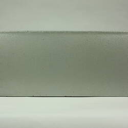 Side of rectangular metal box.