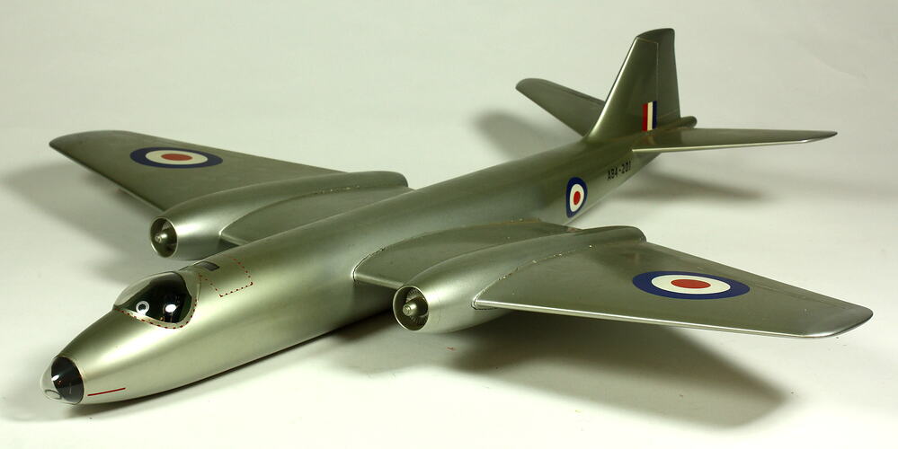 Silver model aeroplane. Three quarter front left view.