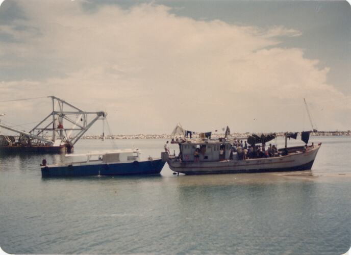 Several boats in harbour.